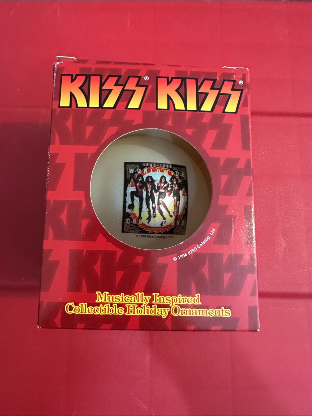 Kiss Red and Yellow Holiday Ornament Packaging